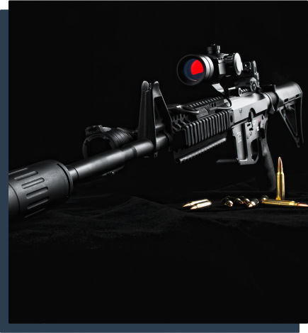A rifle with a red dot sight and bullets, ready for precise targeting and accurate shooting